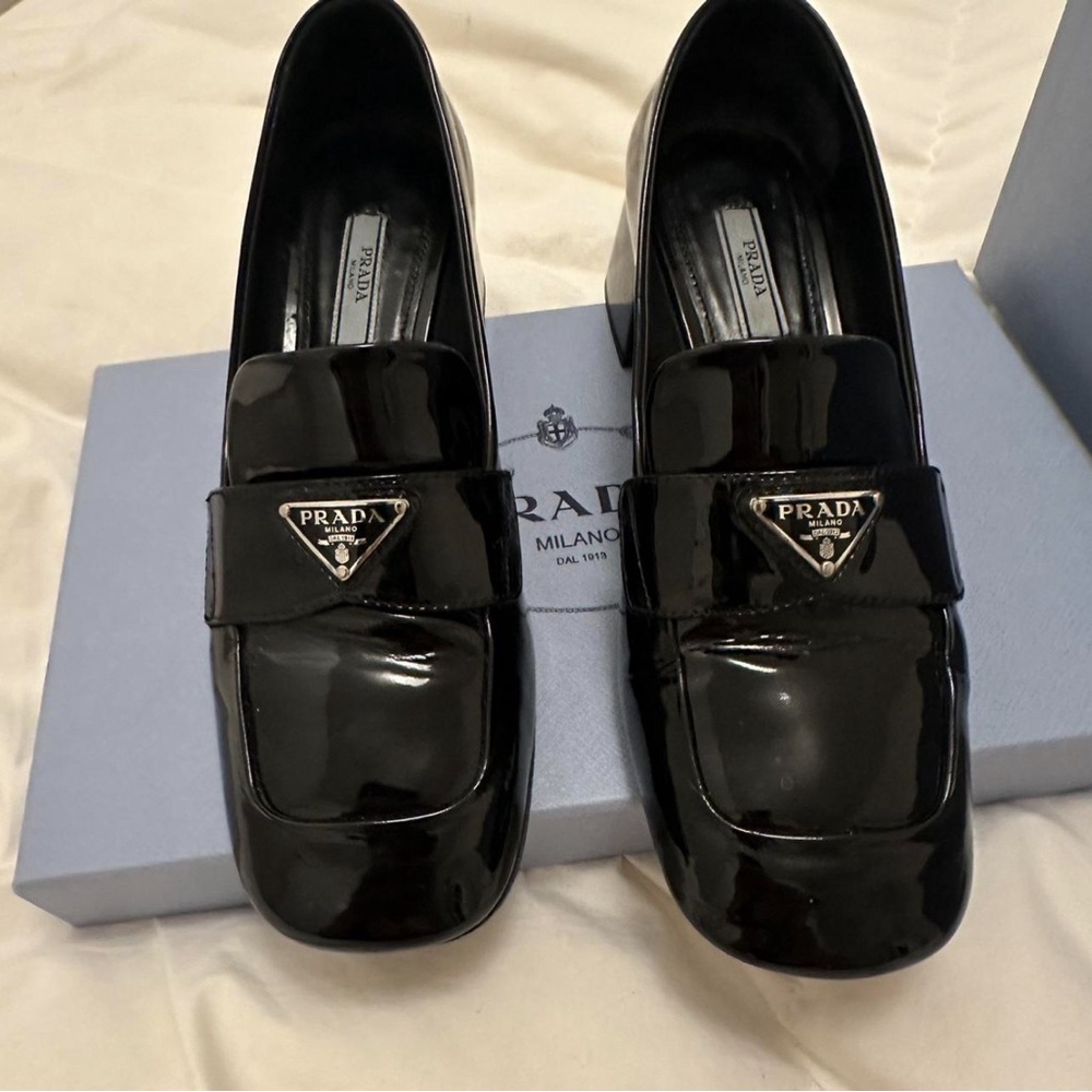 Prada triangle logo loafers